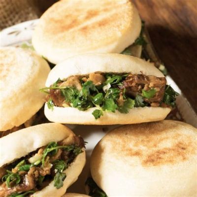  Le Rou Jia Mo: Un Sandwich Dégoulinant de Saveurs Savoureuses et d'une Douceur Irrésistible!