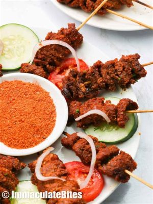  Suya: Un Mélange Piquant de Viande Grillée à la Perfection et des Épices qui Dansent sur la Langue!